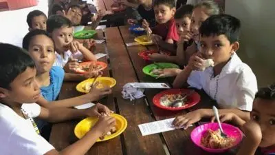 Children eating at the Granada dining hall